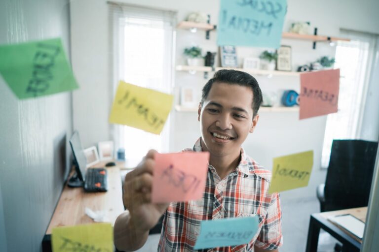 Photo of man in office illustrates blog: "How To Calculate Receivables Turnover?"