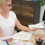 Invoice factoring expansion meeting between business owner and advisor