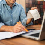 Small business owner using Invoice Factoring California to improve cash flow