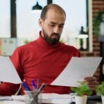 Startup founder using invoice factoring for startups to improve cash flow