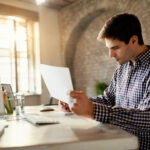 Business owner using invoice data to improve cash flow without more debt