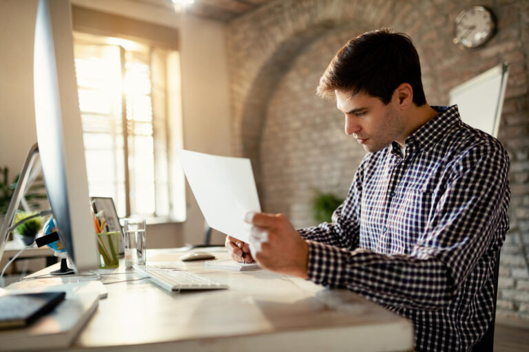 Business owner using invoice data to improve cash flow without more debt