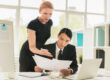 Business owner using factoring to take on bigger clients with confidence