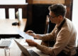 Business owner planning tax season cash flow with invoice factoring