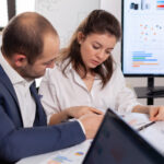 Business owner discussing strong cash flow with a lender