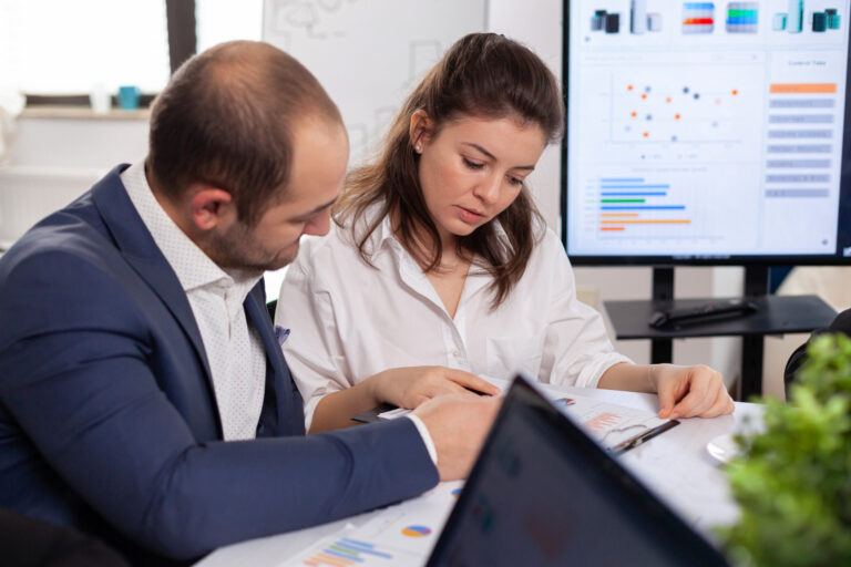 Business owner discussing strong cash flow with a lender