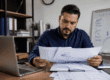 Business owner turning invoices into cash to improve cash flow