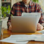 Business owner managing cash flow stress while scaling operations