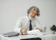 Business owner planning contract growth with stronger cash flow