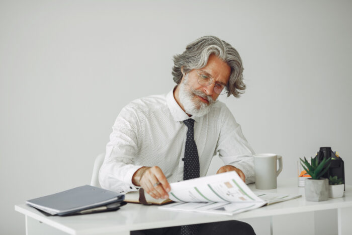 Business owner planning contract growth with stronger cash flow