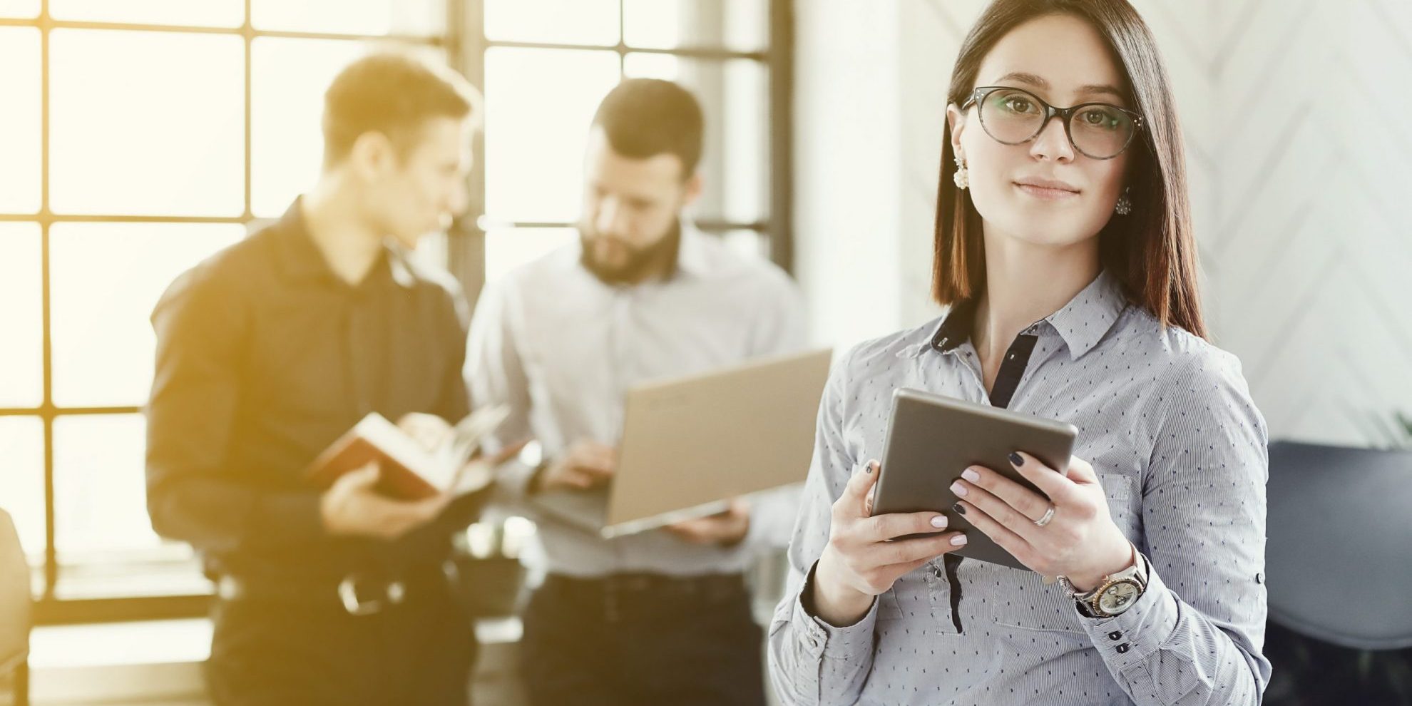 Photo of businesspeople illustrates blog: "Is receivables factoring debt?"