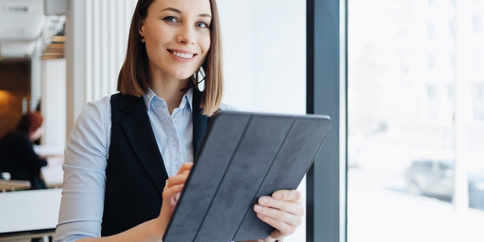 Photo of businesswoman illustrates blog "4 Things You Want in a Receivables Factoring Company"