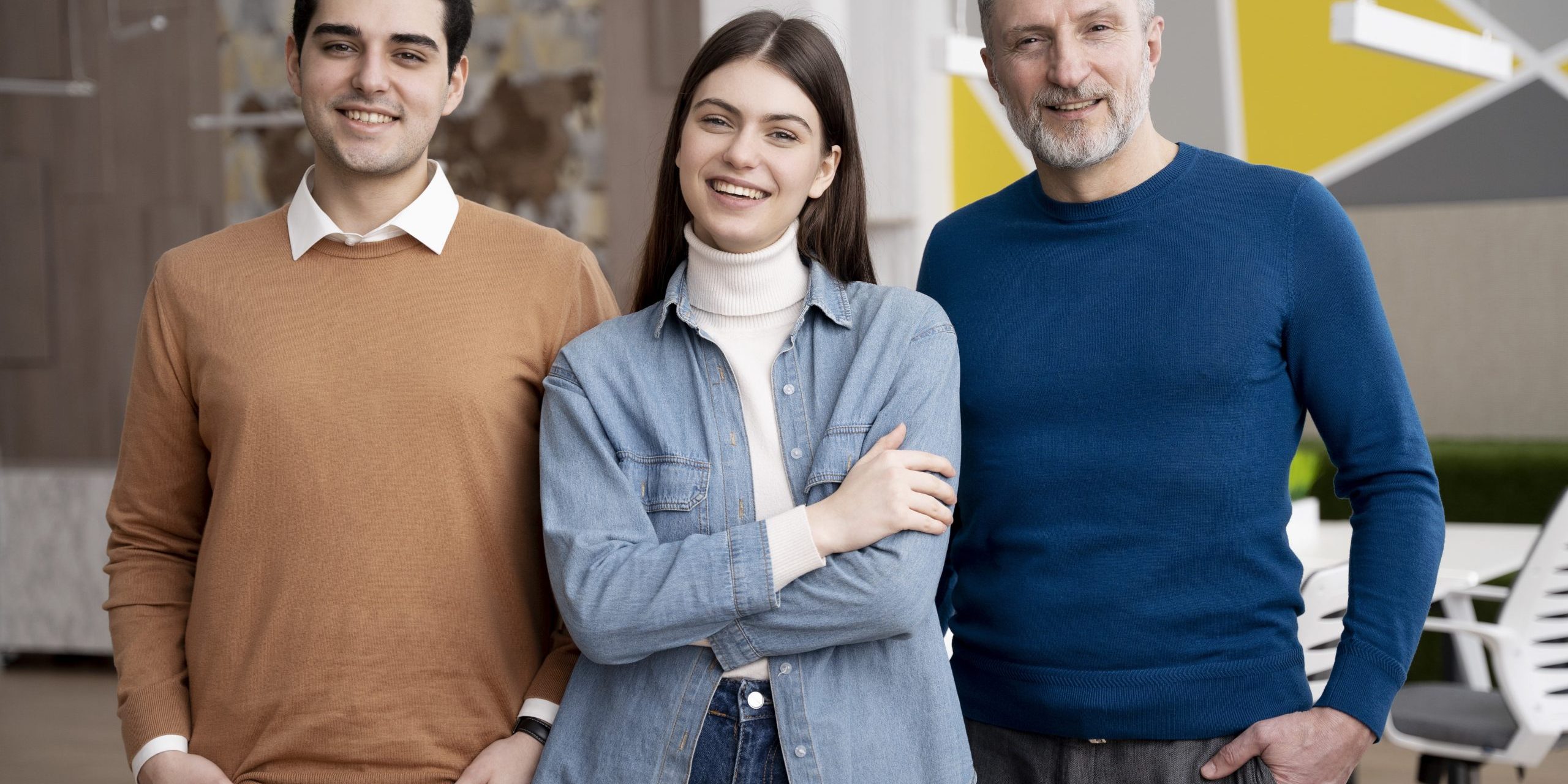 casual-businesspeeople-fp Two men and a woman smiling and dressed casually illustrate blog "What Is a Factoring Company? "